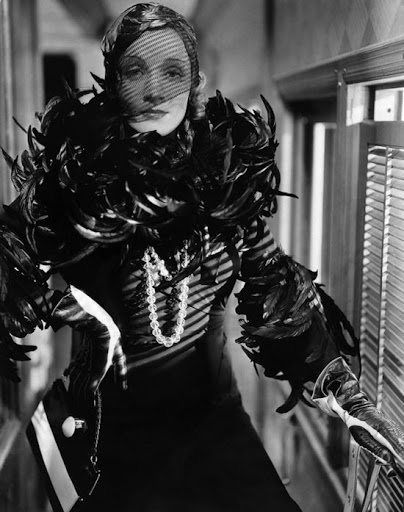 Dietrich's incarnation as the vampish Shanghai Express 1932, where Dietrich's Shanghai Lily is the embodiment of the stateless taxi-dancer a character redolent with dark Russian motifs.
