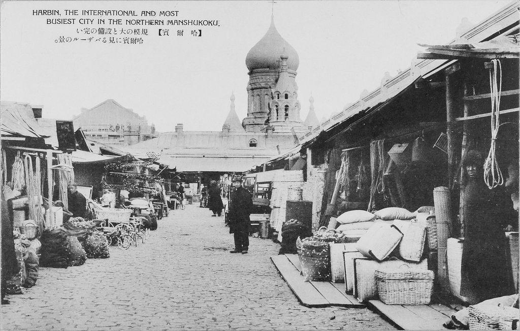 Harbin was not a city - it was an echo.

Russian churches rose over Chinese streets. Snow fell on signs written in several alphabets. Music drifted from cafés where no one truly belonged, yet everyone pretended they did.

It was here, in 1908, that Sergei Ermolaeff was born.

He learned rhythm before language - train wheels on iron tracks, boots in snow, the low murmur of displaced voices. His childhood was not rooted in land but in movement.

Harbin did not teach permanence.
It taught improvisation.

And somewhere within that restless city, the paths of two lives - still unknown to each other -began to align.

“The war had taught him that everything was possible, even the things he could not imagine.”
- Empire of the Sun